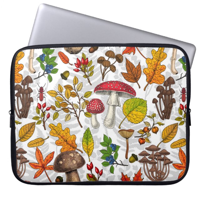 Autumn mushrooms, leaves, nuts and berries on whit laptop sleeve (Front)