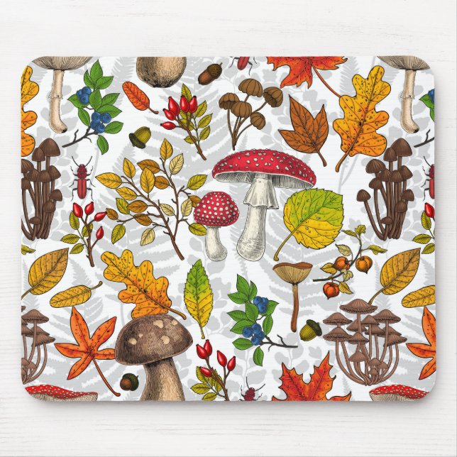 Autumn mushrooms, leaves, nuts and berries on whit mouse mat (Front)