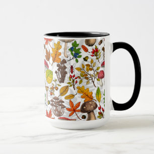 Autumn mushrooms, leaves, nuts and berries on whit mug