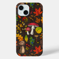 Autumn mushrooms,nuts and berries on dark