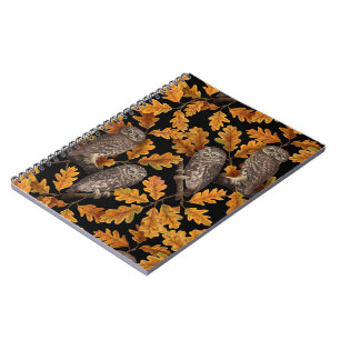 Autumn owls on black notebook