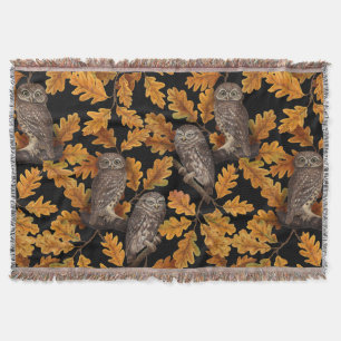 Autumn owls on black throw blanket