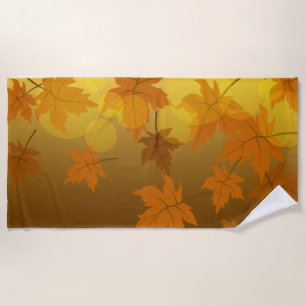 Autumn pattern with falling maple leaves and bokeh beach towel