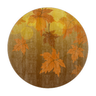 Autumn pattern with falling maple leaves and bokeh cutting board