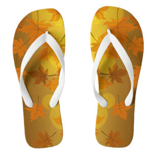 Autumn pattern with falling maple leaves and bokeh flip flops