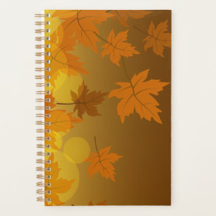 Autumn pattern with falling maple leaves and bokeh planner