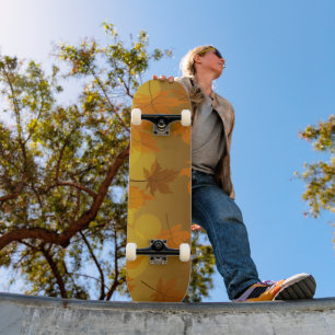 Autumn pattern with falling maple leaves and bokeh skateboard