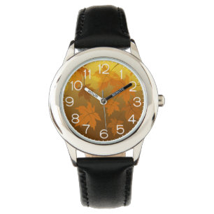 Autumn pattern with falling maple leaves and bokeh watch