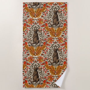 Autumn rabbit on off white beach towel