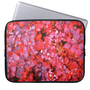 Autumn red violet vibrant bush foliage background laptop sleeve