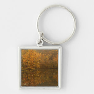 Autumn reflections on pond. key ring