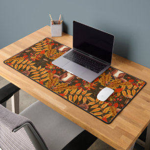Autumn squirrel on dark brown desk mat