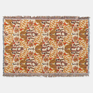 Autumn squirrel on off white throw blanket