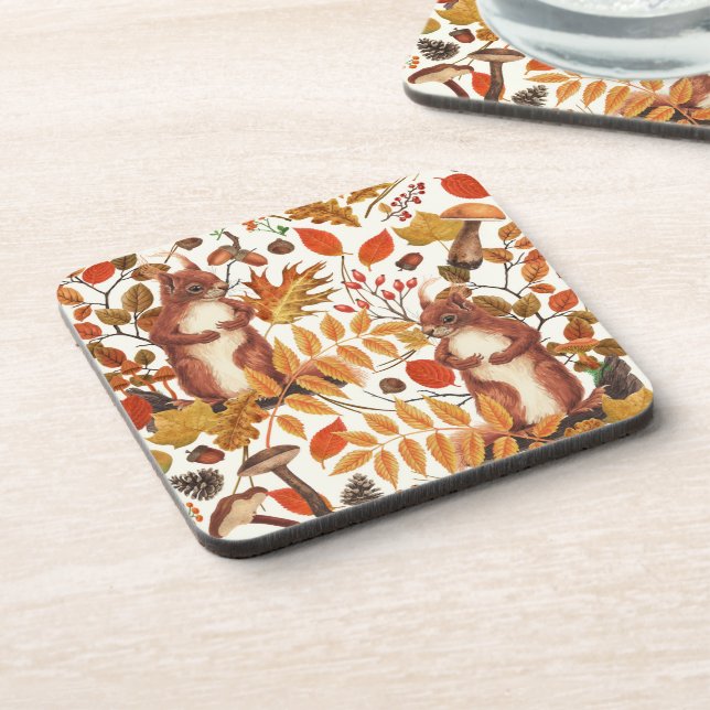 Autumn squirrels and autumnal flora on off white coaster (Left Side)