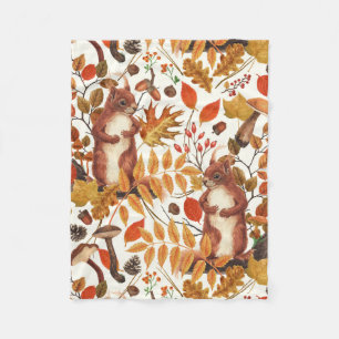 Autumn squirrels and autumnal flora on off white fleece blanket