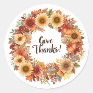 Autumn themed thanksgiving with flowers pumpkins classic round sticker