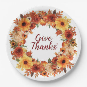 Autumn themed thanksgiving with flowers pumpkins paper plate