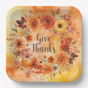 Autumn themed thanksgiving with flowers  pumpkins paper plate