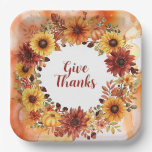 Autumn themed thanksgiving with flowers  pumpkins paper plate