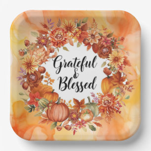 Autumn themed thanksgiving with flowers pumpkins paper plate