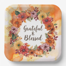 Autumn themed thanksgiving with flowers pumpkins