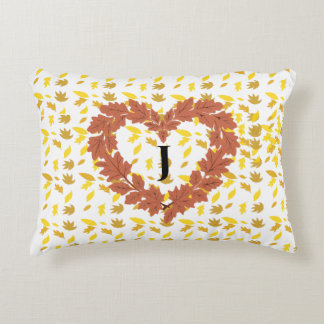 autumn wreath on its bed of leaves decorative cushion
