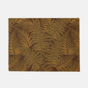 Autumnal fern on brown doormat