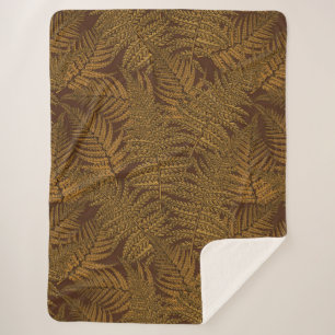 Autumnal fern on brown sherpa blanket