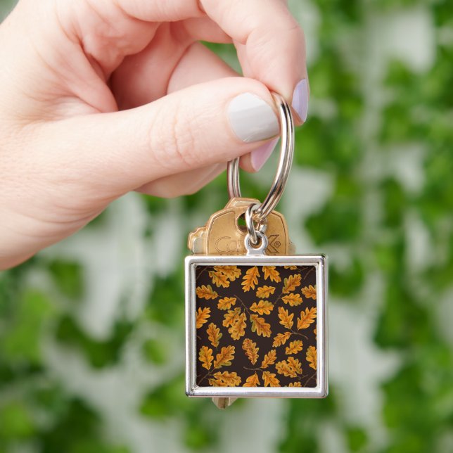 Autumnal oak leaves on dark brown key ring (Hand)