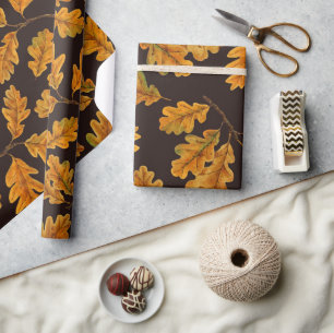 Autumnal oak leaves on dark brown wrapping paper