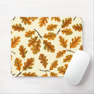 Autumnal oak leaves on off white mouse mat