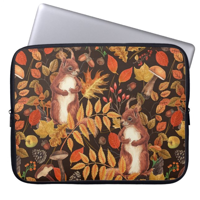 Autumnal squirrels and flora on dark brown laptop sleeve (Front)