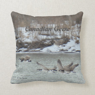 B7 Canadian Geese in Flight Over River Cushion