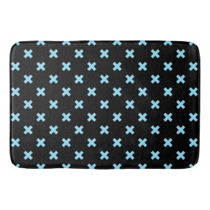 Baby blue cross stitches on black bath mat