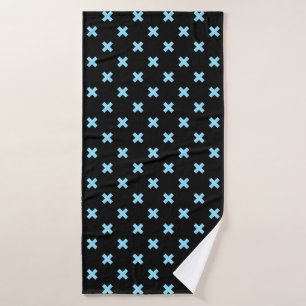 Baby blue cross stitches on black bath towel