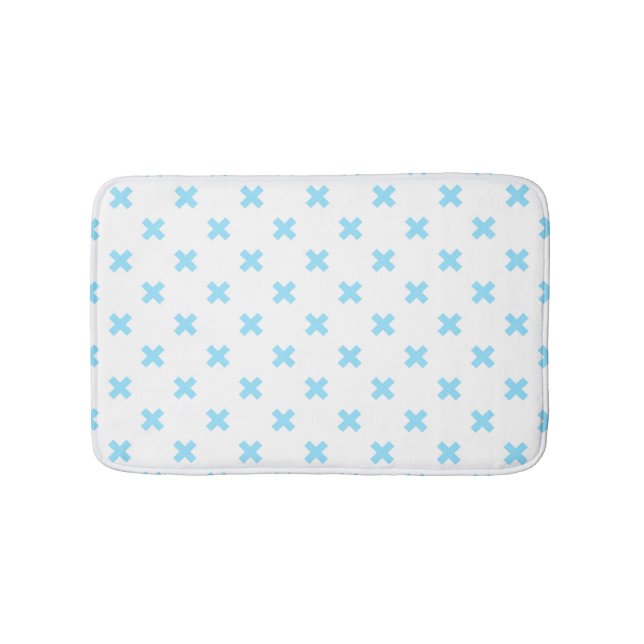 Baby blue cross stitches on white bath mat (Front)