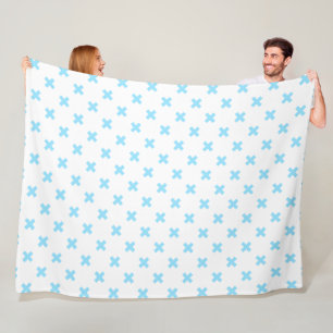 Baby blue cross stitches on white fleece blanket