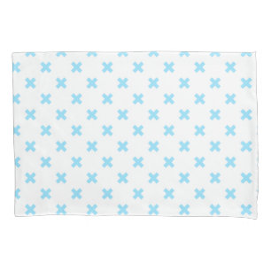 Baby blue cross stitches on white pillowcase