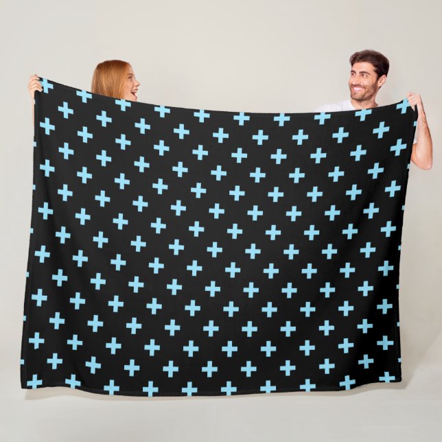 Baby blue polka crosses on black fleece blanket (In Situ)
