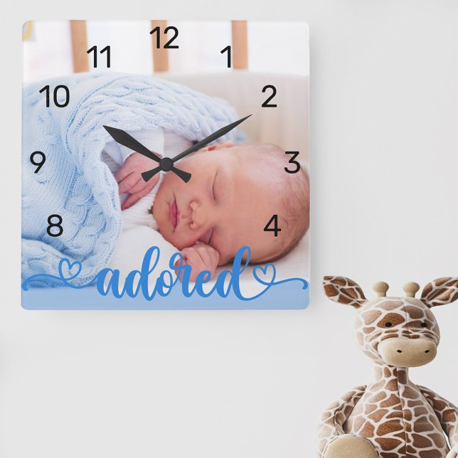 Baby Boy Photo Blue Adored Calligraphy Nursery Square Wall Clock (New baby photo clock for the nursery lettered with "adored" and decorated with love hearts)