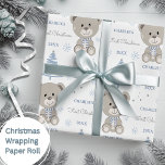 Baby Boys First Christmas Teddy Bear Blue Wrapping Paper<br><div class="desc">Make their very first Christmas special with personalised wrapping paper featuring a cute teddy bear,  tree and snowflakes.  Easily update the name and year and be sure to check out my collection for lots more choices.</div>