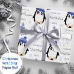 Baby Boys First Christmas Winter Penguin Blue Wrapping Paper<br><div class="desc">Make their very first Christmas special with personalised wrapping paper featuring a cute winter penguin,  tree and snowflakes.  Easily update the name and year and be sure to check out my collection for lots more choices.</div>