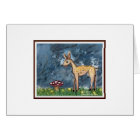 baby deer eating mushroom