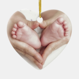 Baby feet in mother hands ceramic tree decoration