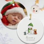 Baby First Christmas Snowman Photo Ceramic Tree Decoration<br><div class="desc">Adorable first Christmas baby ornament with an exclusive illustration of a cute snowman and some animal friends on one side. On the other side you can add the photo of your baby. Great way to celebrate and treasure your baby's first Christmas and a great keepsake for grandparents and other members...</div>