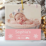 Baby Girl First Christmas Custom Photo Pink Ceramic Ornament<br><div class="desc">Celebrate your baby girl's first Christmas with this adorable ornament,  featuring white text,  snowflakes and banner on a blush pink background. Personalize it with baby's photo,  her name in white sketched font,  and the year on the banner below.</div>