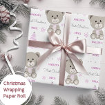 Baby Girls First Christmas Teddy Bear Pink Wrapping Paper<br><div class="desc">Make their very first Christmas special with personalised wrapping paper featuring a cute teddy bear,  tree and snowflakes.  Easily update the name and year and be sure to check out my collection for lots more choices.</div>