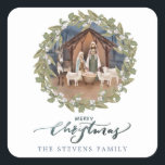 Baby Jesus in the Manger Nativity  Square Sticker<br><div class="desc">These traditional Christmas stickers feature a nativity image of baby Jesus sleeping in a manger with Mary and Joseph in the centre surrounded by a berry wreath. Below are the words "Merry Christmas."  You can personalise with your name.</div>