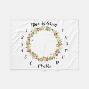 baby milestone blanket with field flowers and butt