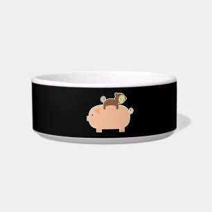 Baby Monkey Riding Backwards on a Pig Bowl